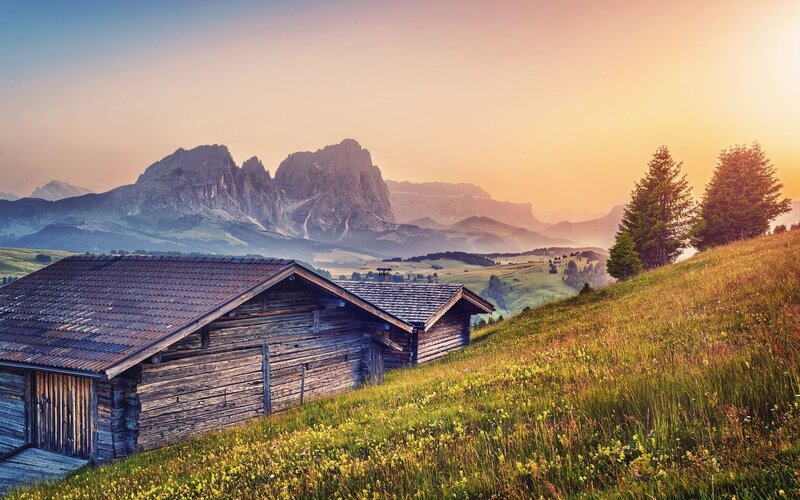 Wooden Cabins in Mountains — Green, Serene, Sunset, Photograph
