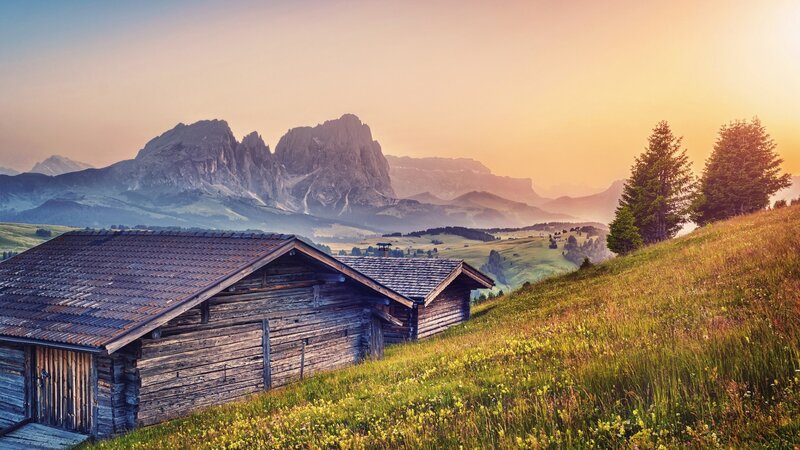 Wooden Cabins in Mountains — Green, Serene, Sunset