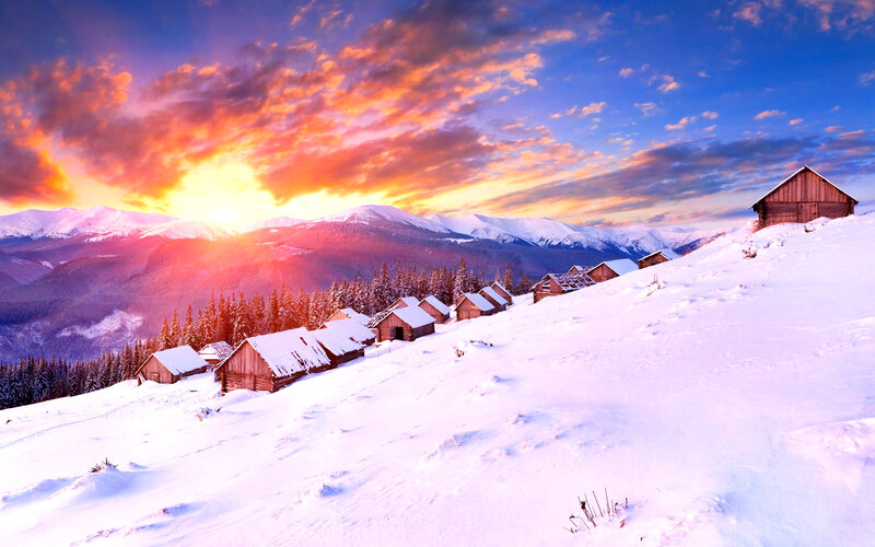 Wooden Cabins in Snow
