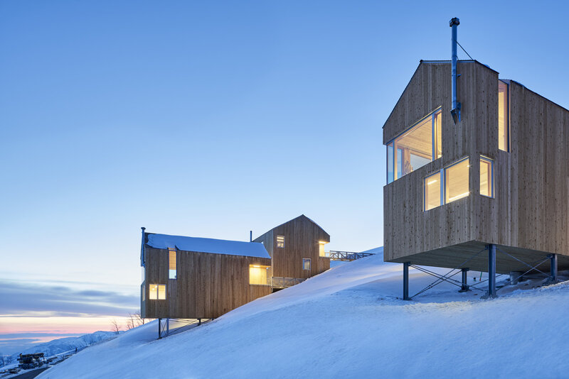 Wooden Cabins on Snow