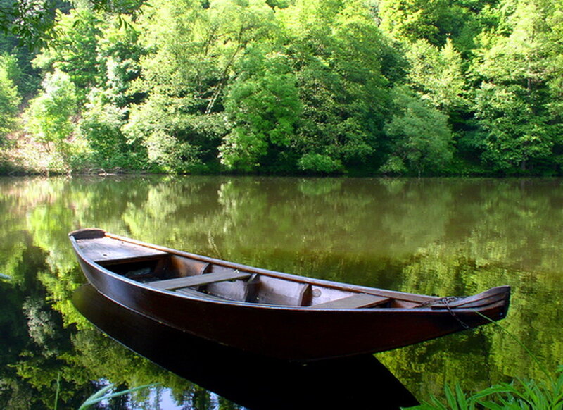 Wooden Canoe on Lake