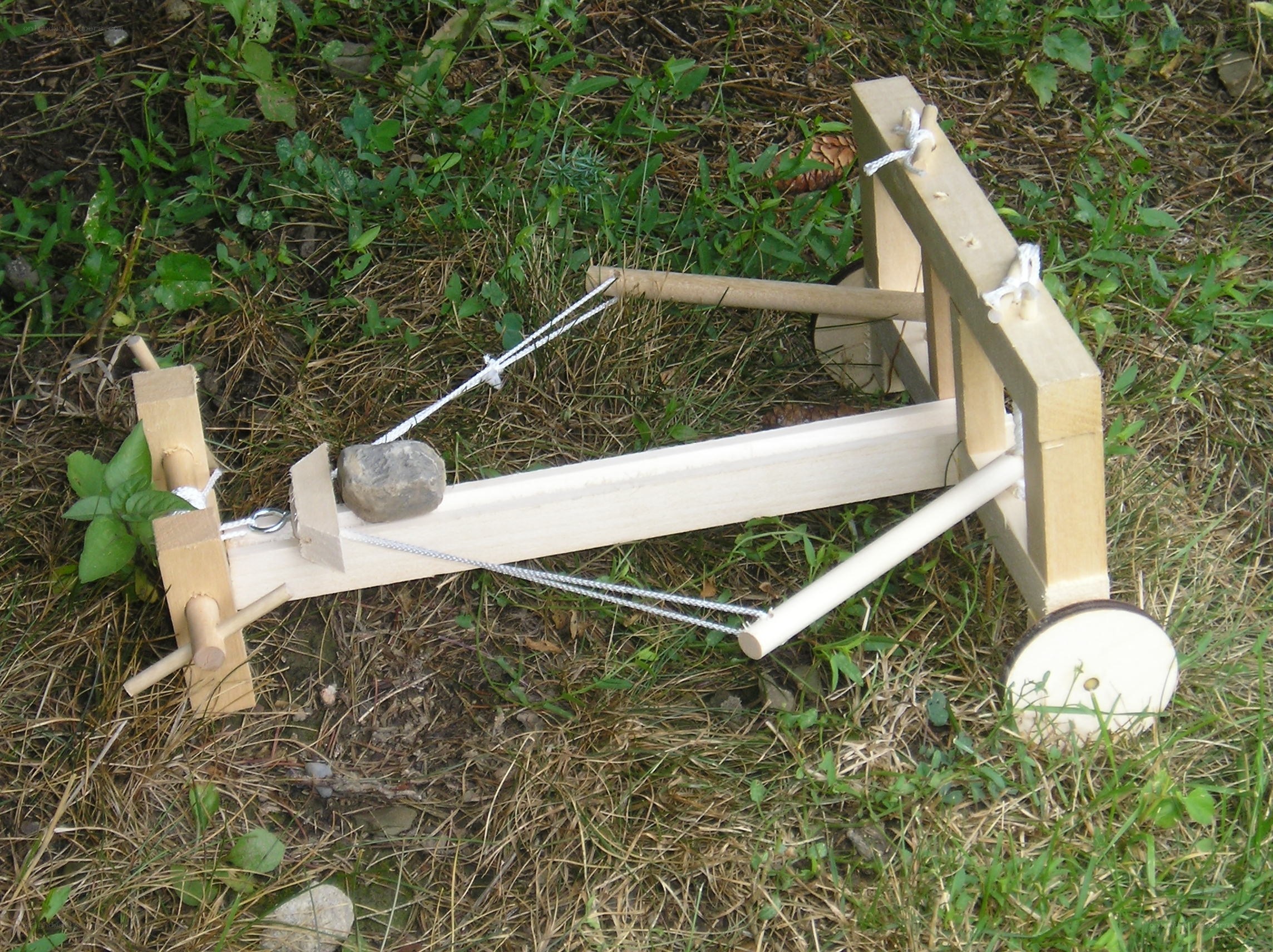 wooden catapult on grass