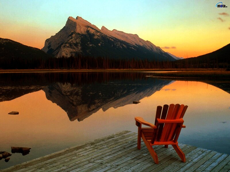 Wooden Chair on Dock — Orange, Serene, Sunset, Photograph