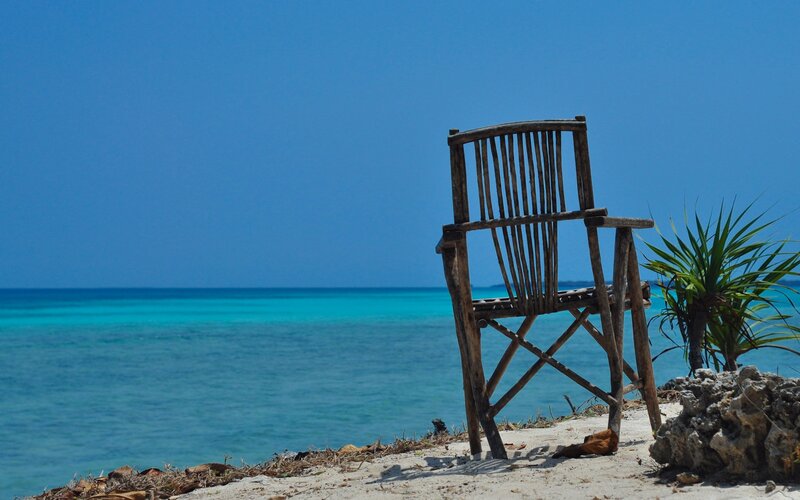 Wooden chair on tropical beach