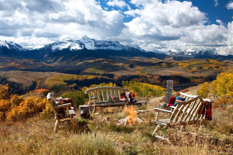 Wooden Chairs in Mountains