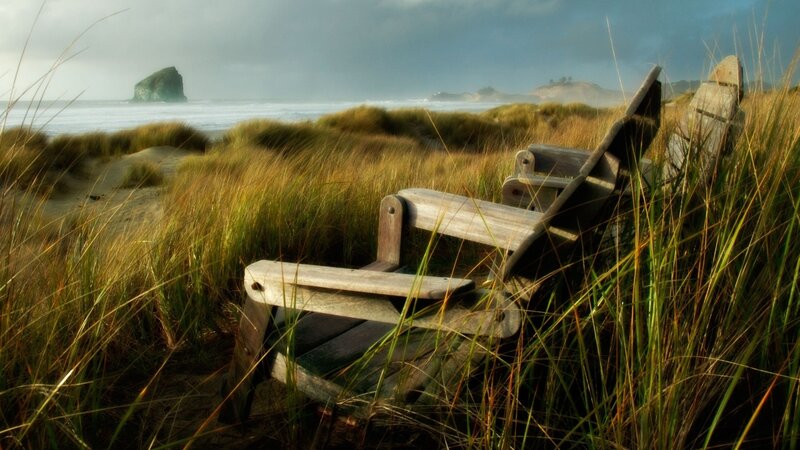 Wooden chairs on a beach