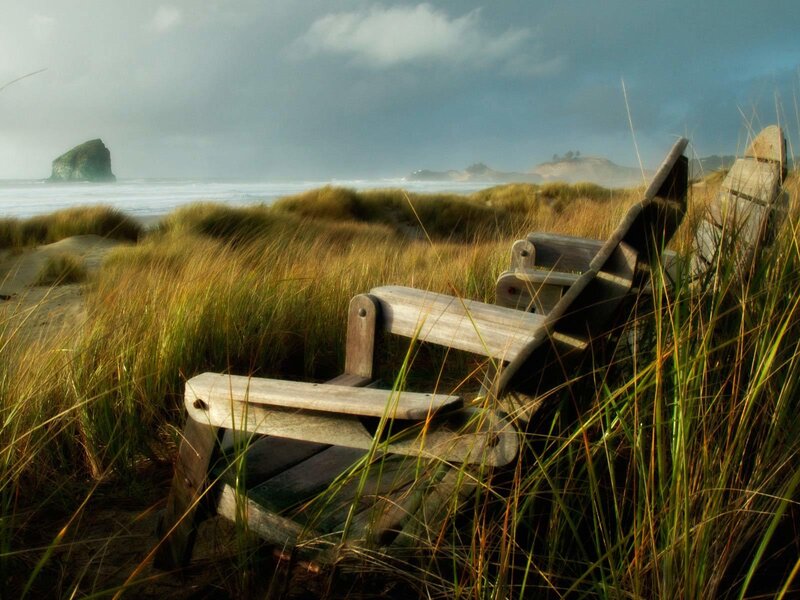 Wooden chairs on a beach