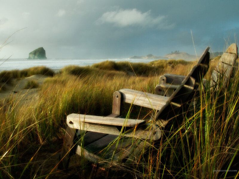 Wooden chairs on a beach