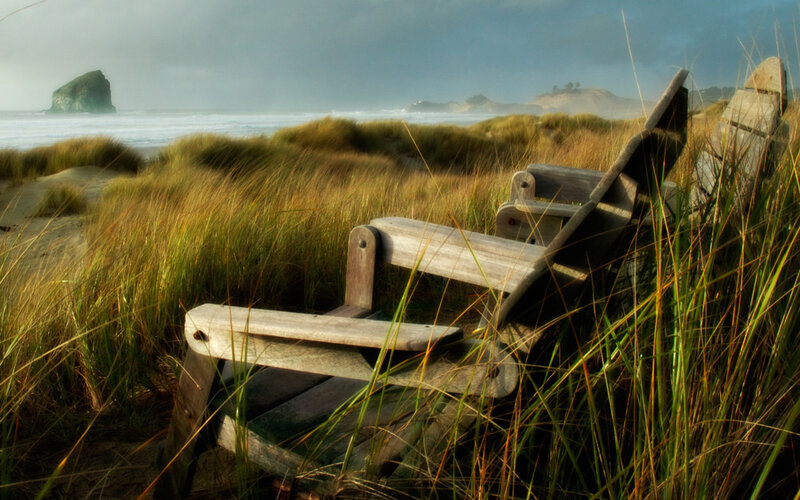 Wooden chairs on a beach