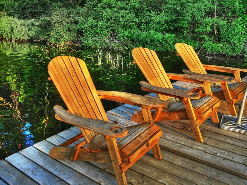 Wooden chairs on a dock