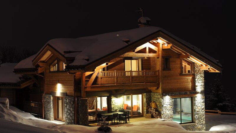 Wooden Chalet at Night