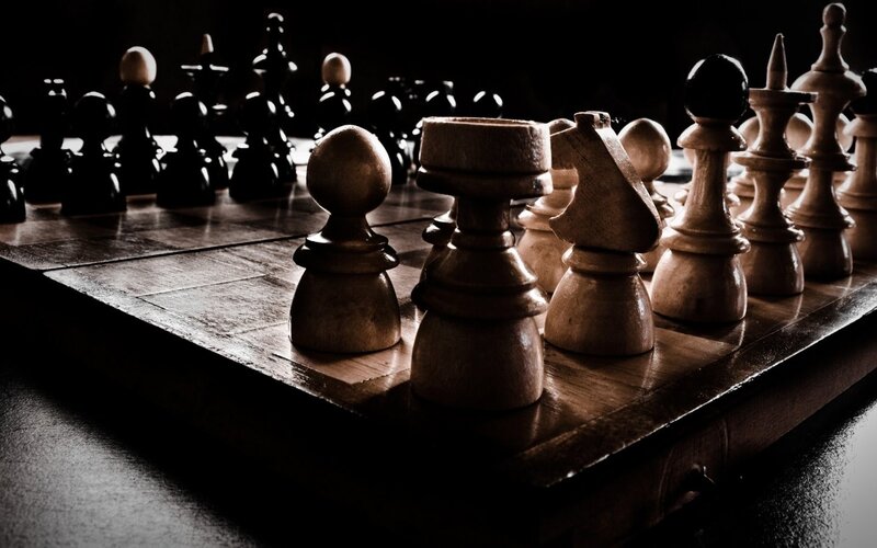 Wooden Chess Pieces on Board — Brown