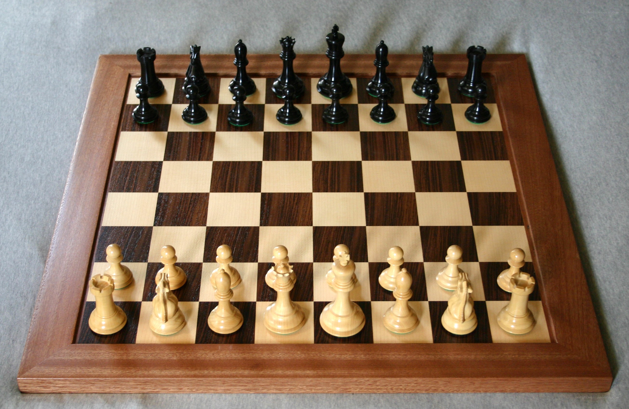 wooden chess set on board