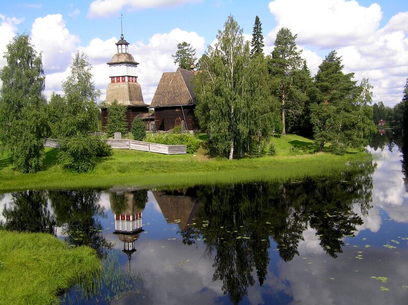 Wooden church by a lake