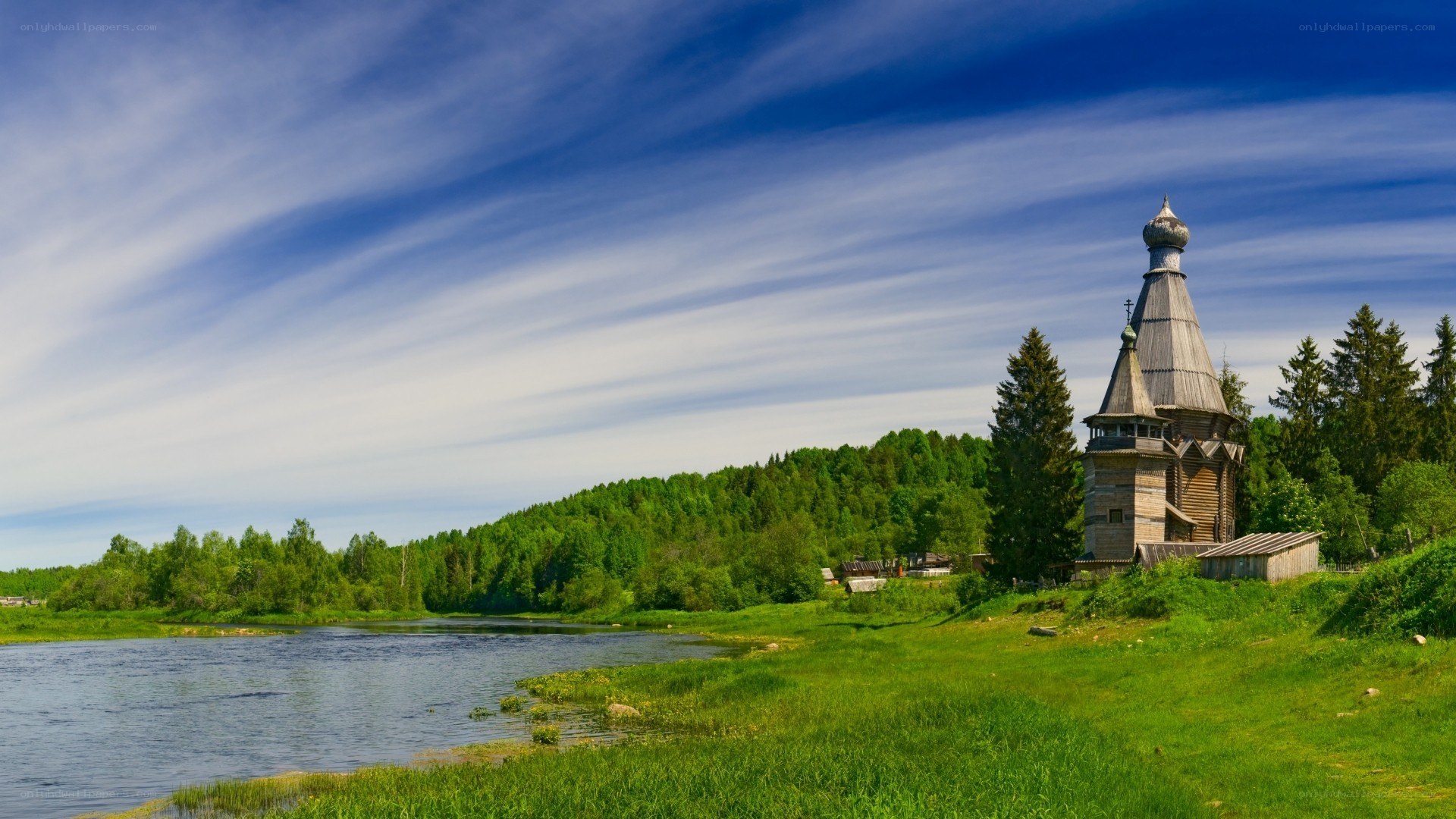 Wooden church by a river