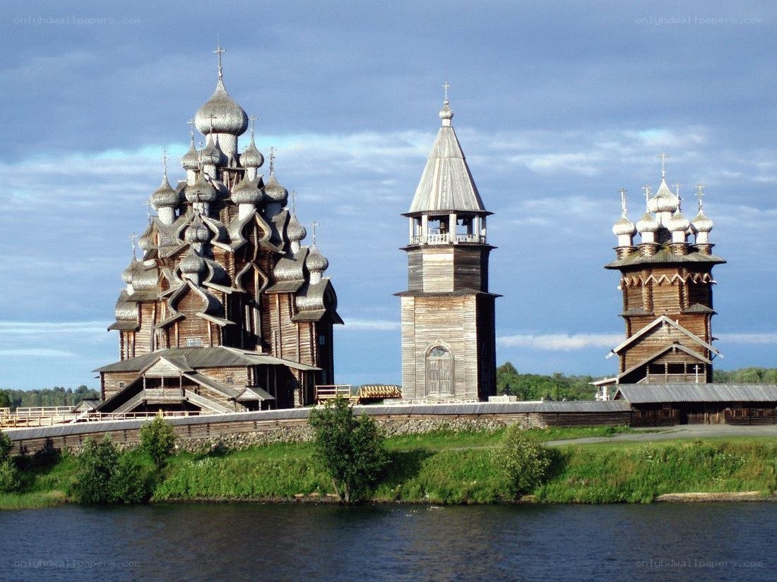 Wooden church complex by river