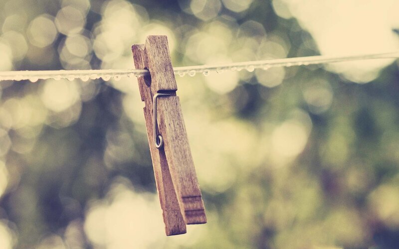 wooden clothespin on a line