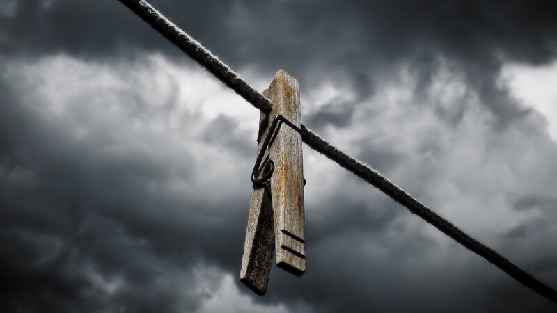 Wooden Clothespin on Rope — Gray, Dramatic, Photograph