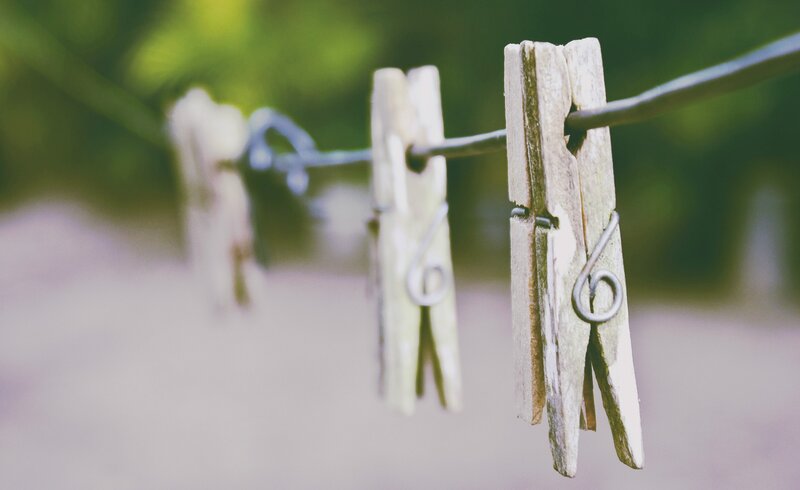 Wooden Clothespins on Line — Brown