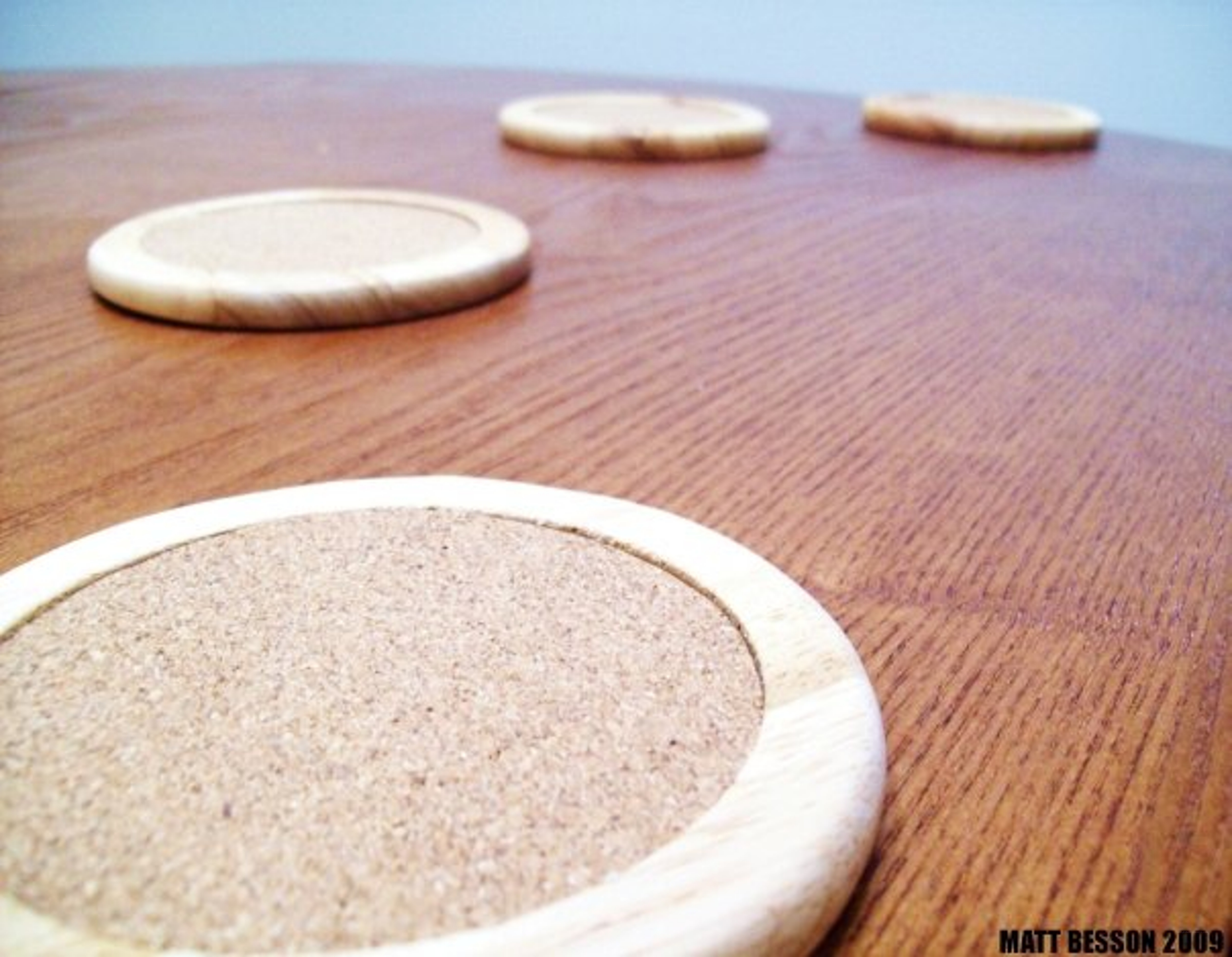 wooden coasters on table