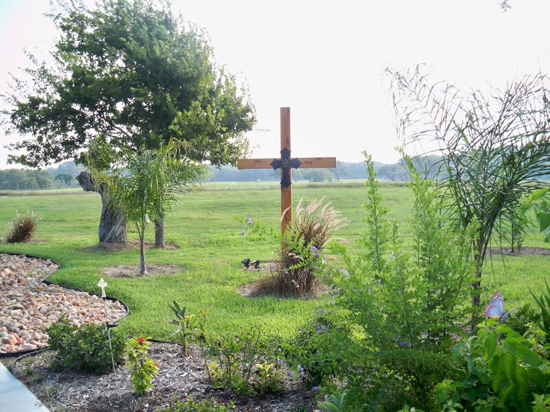 Wooden Cross in Garden