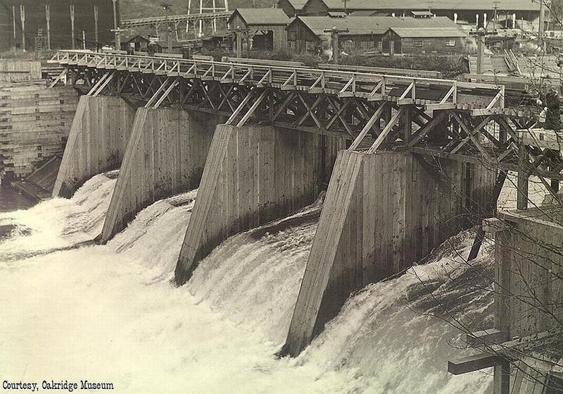 Wooden dam with water flow