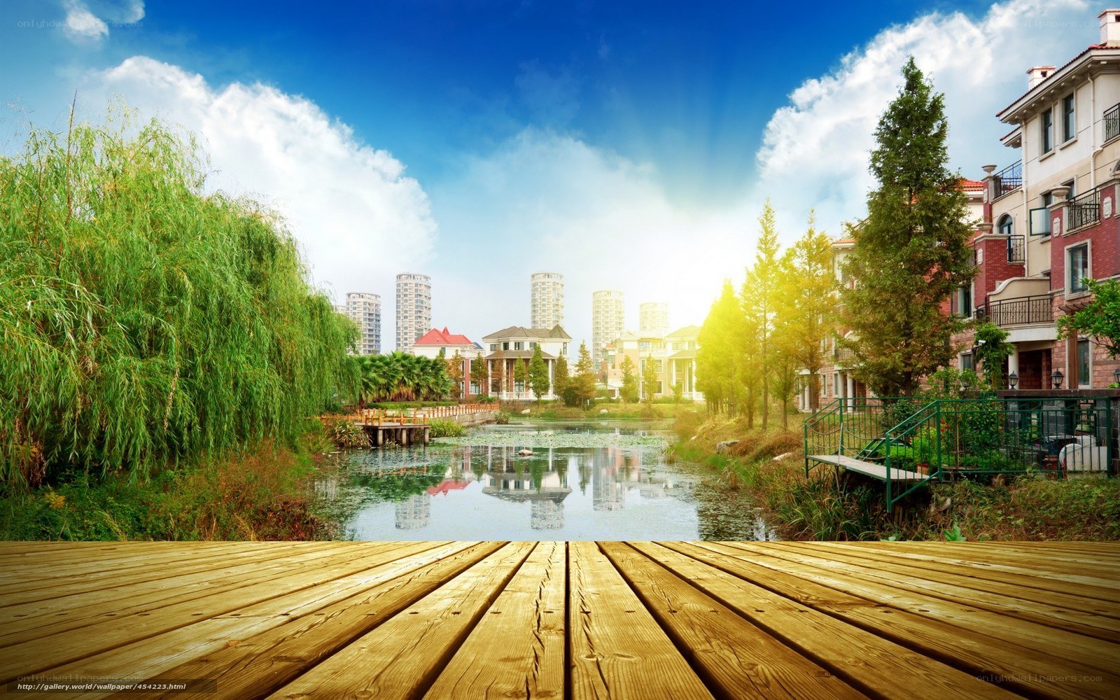 Wooden deck by a city pond