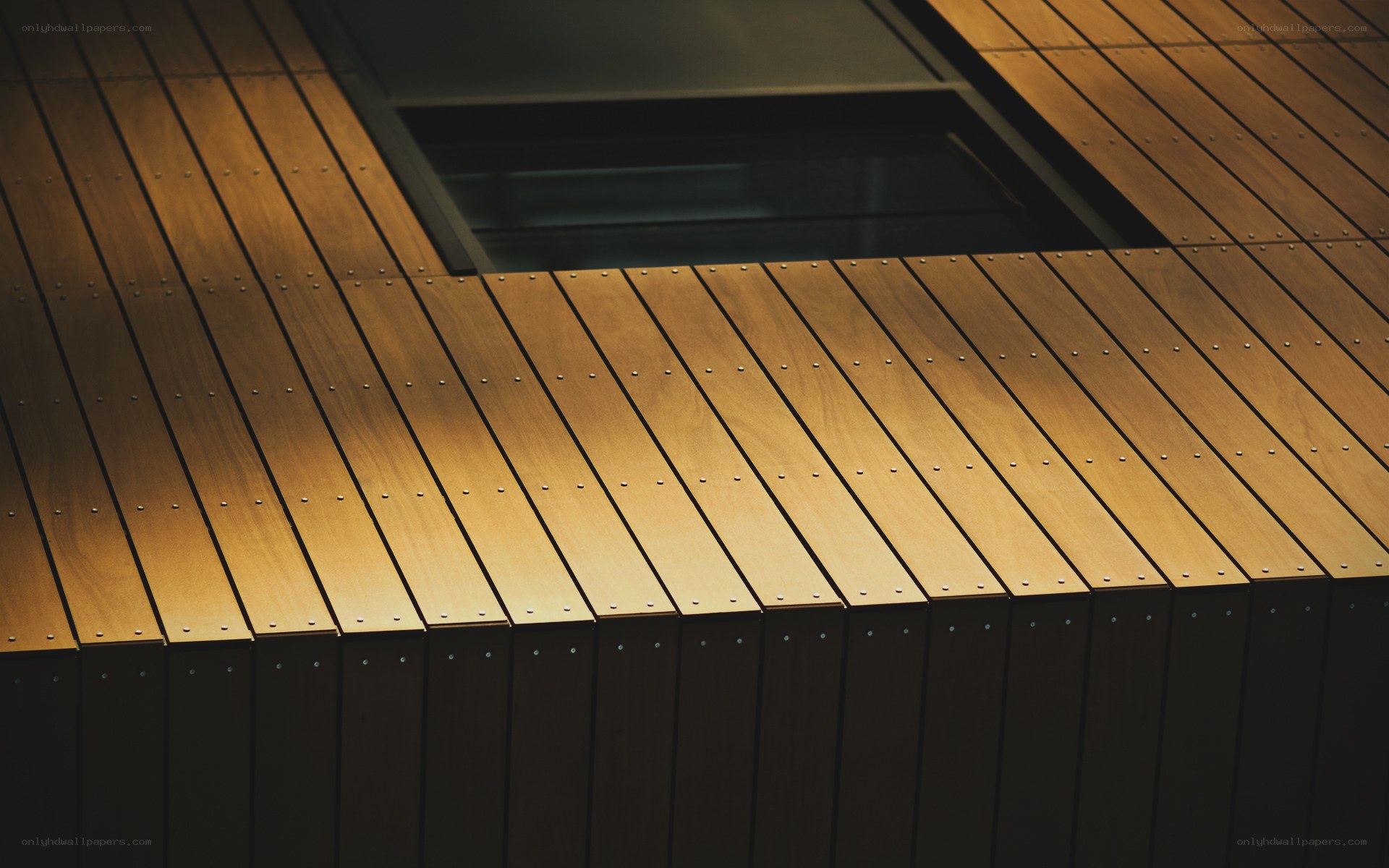 wooden deck with skylight