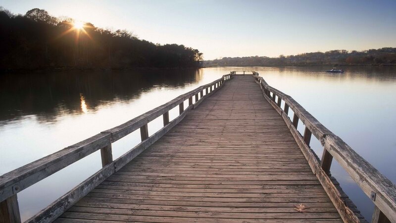 Wooden dock at sunrise