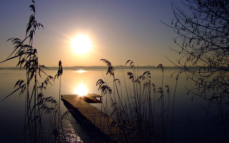 Wooden Dock at Sunrise — Blue, Serene, Photograph, Sun