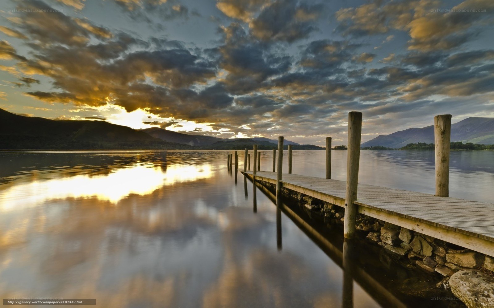 Wooden dock at sunset