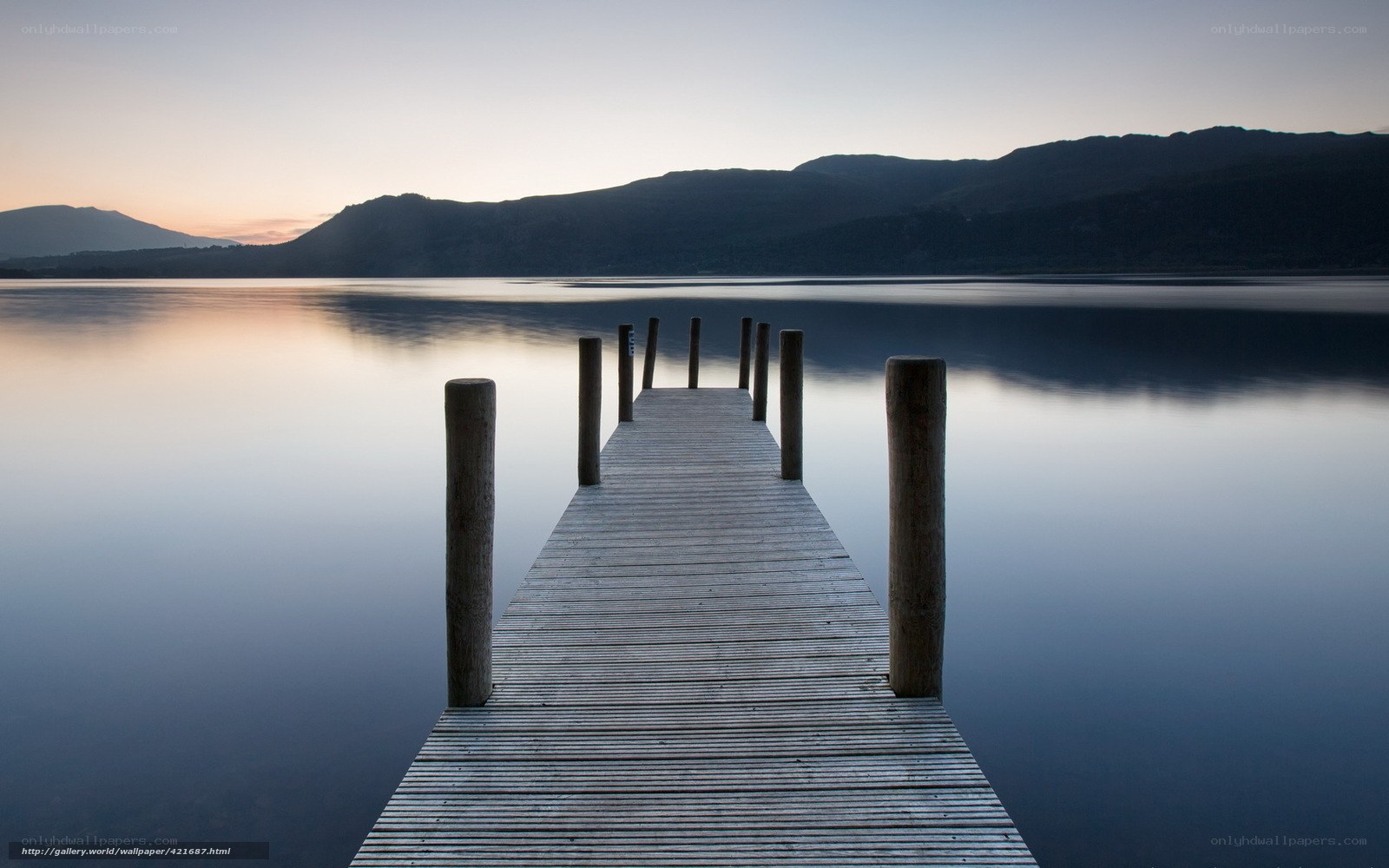 Wooden dock at sunset
