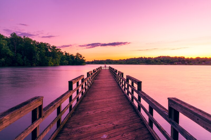 Wooden dock at sunset
