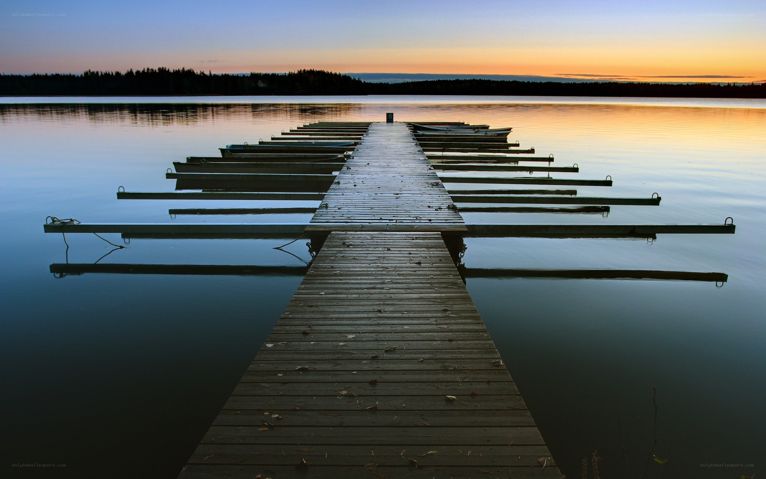 Wooden dock at sunset