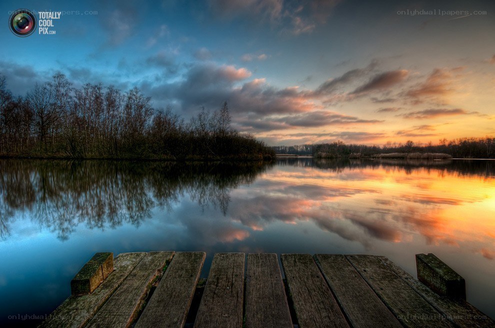 Wooden dock at sunset