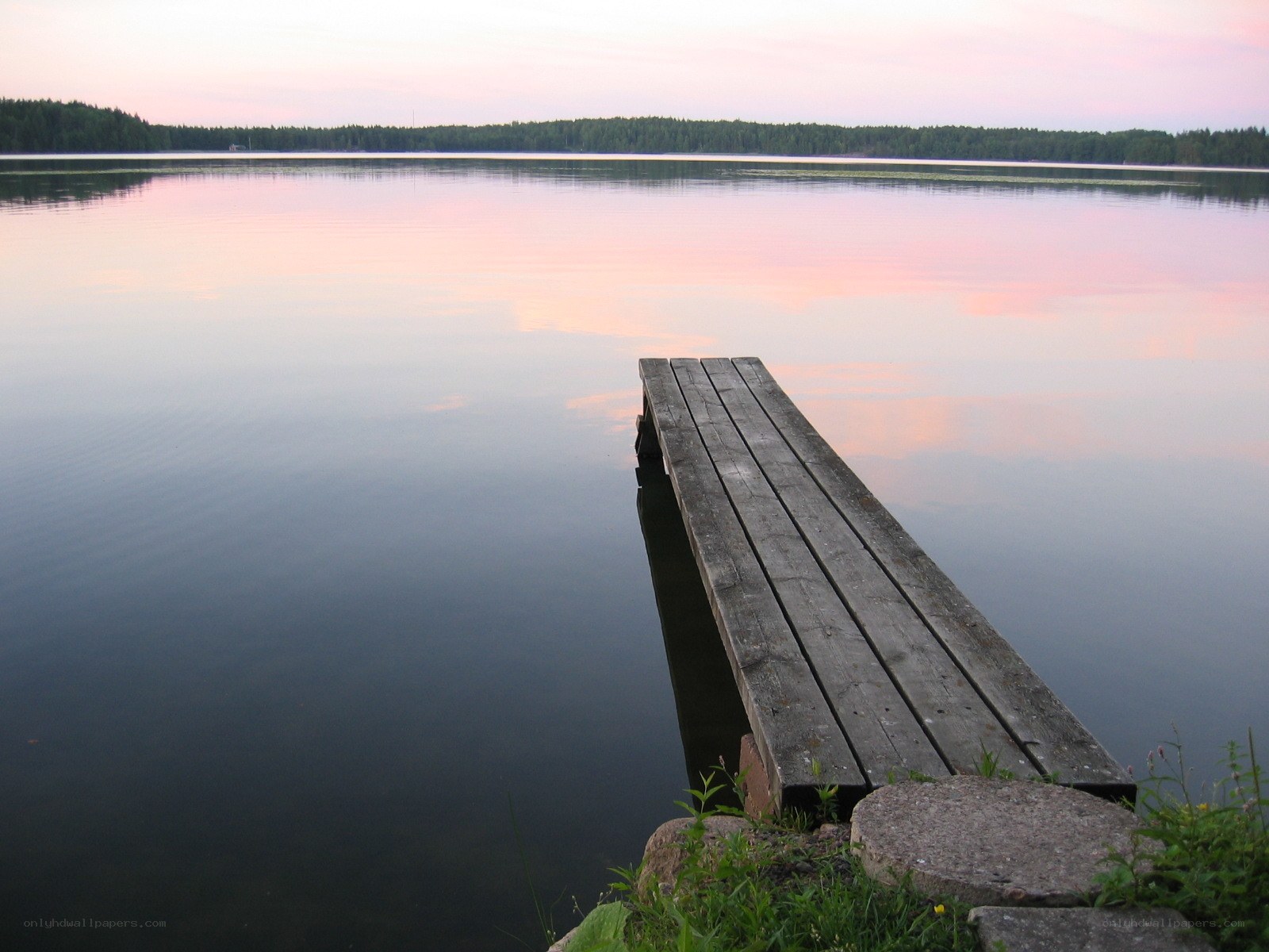 Wooden dock at sunset