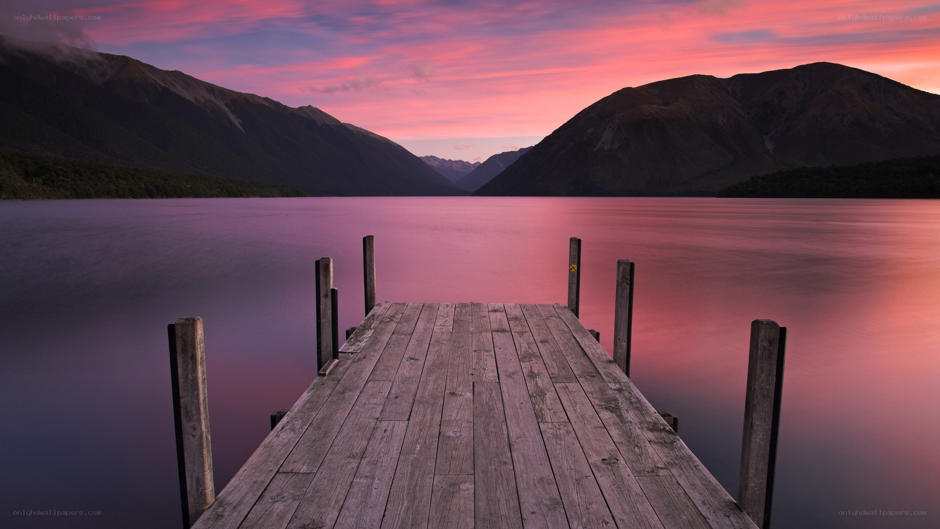 Wooden dock at sunset
