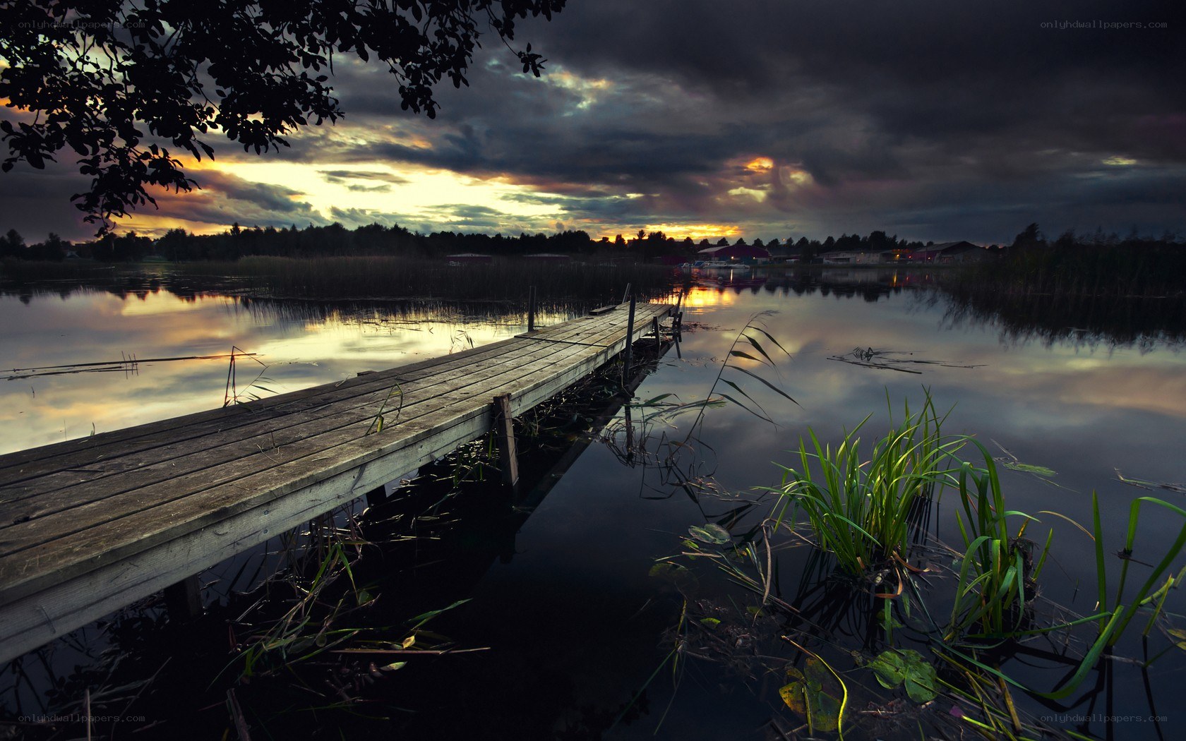 Wooden dock at sunset