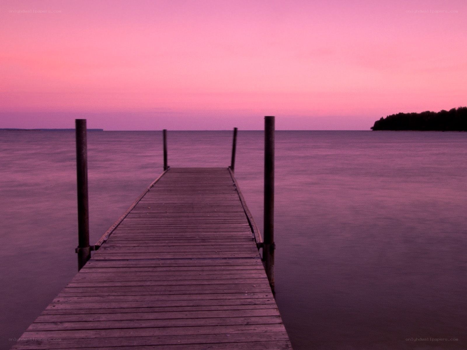 Wooden dock at sunset