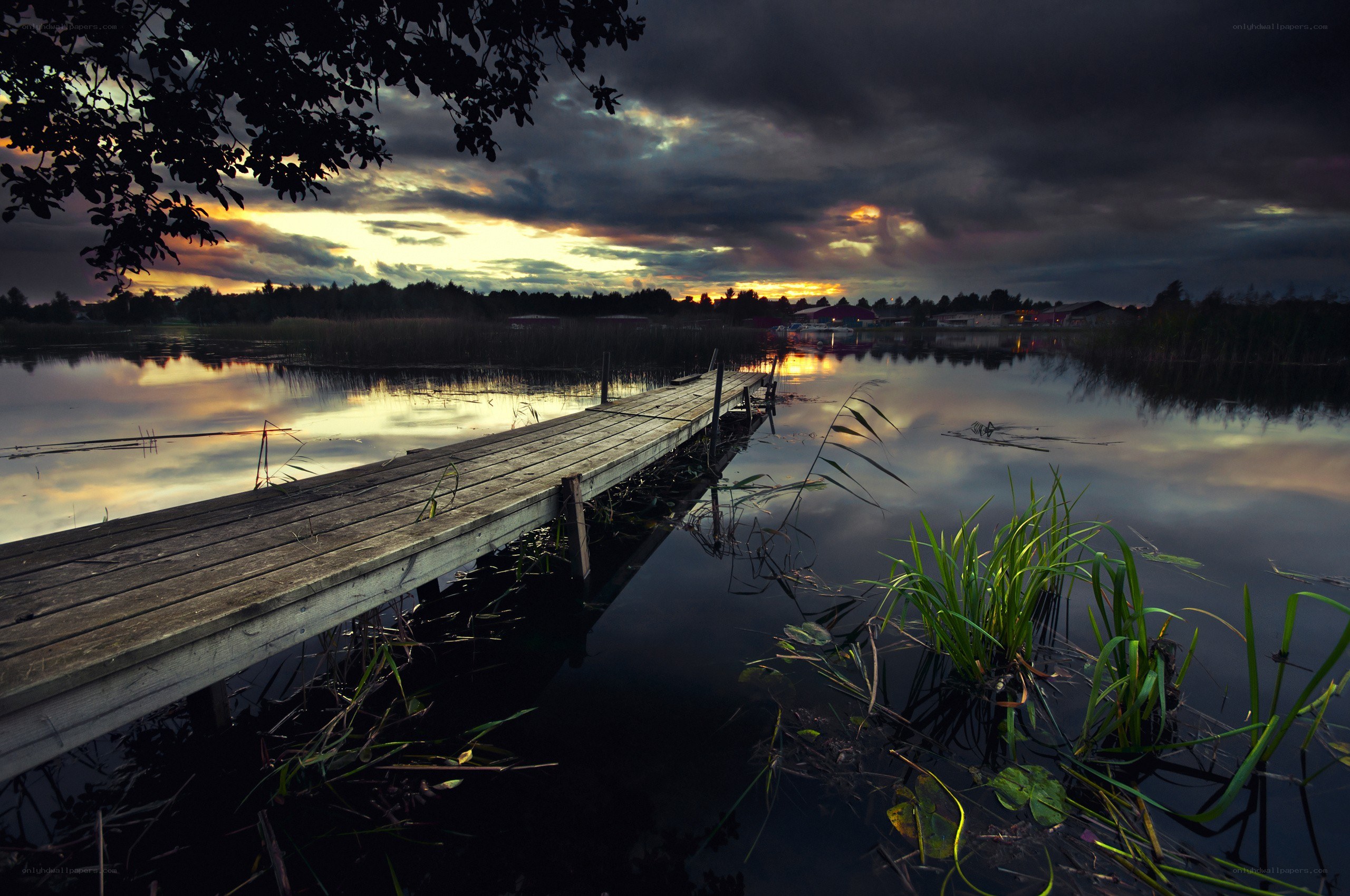 Wooden dock at sunset