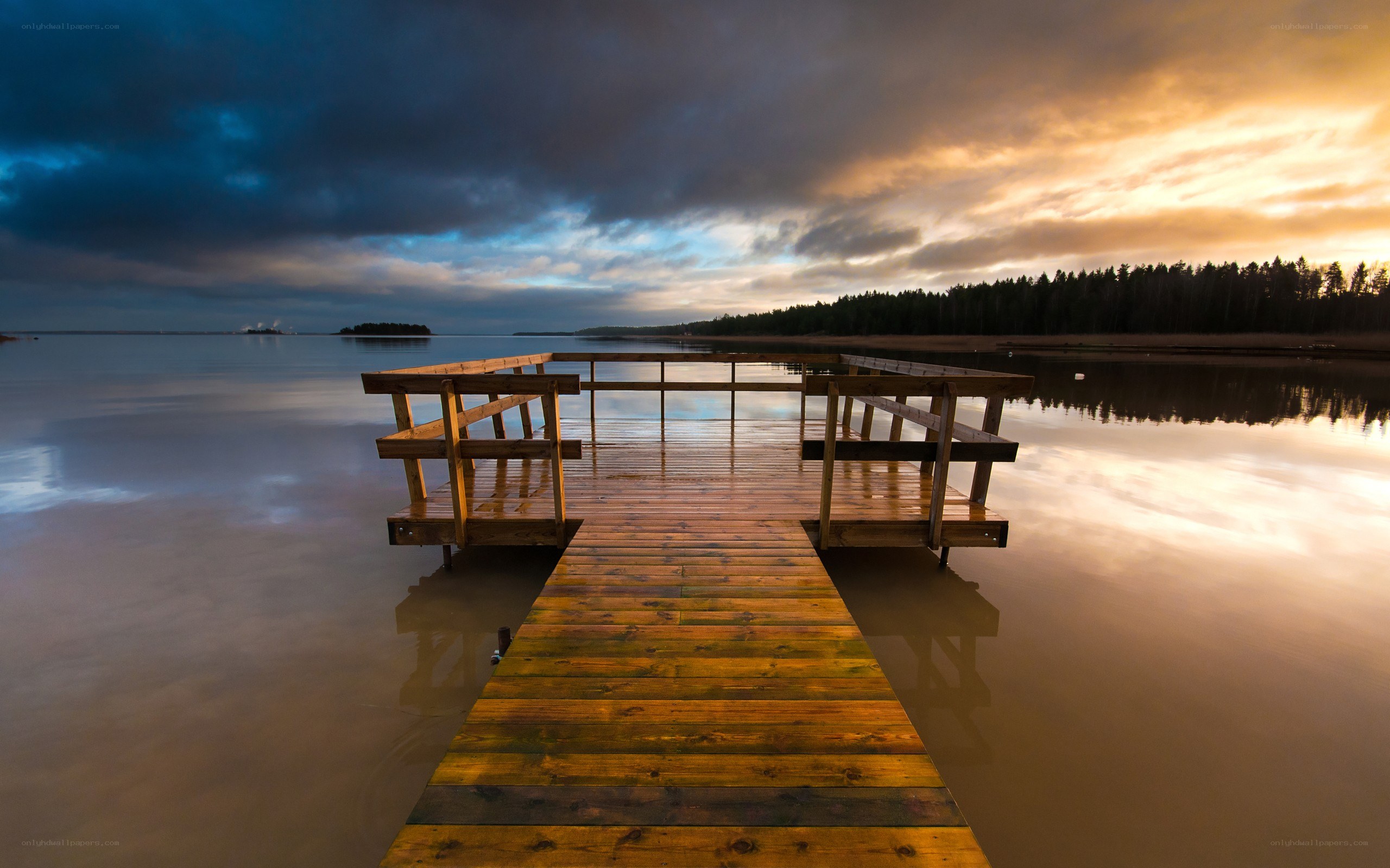 Wooden dock at sunset