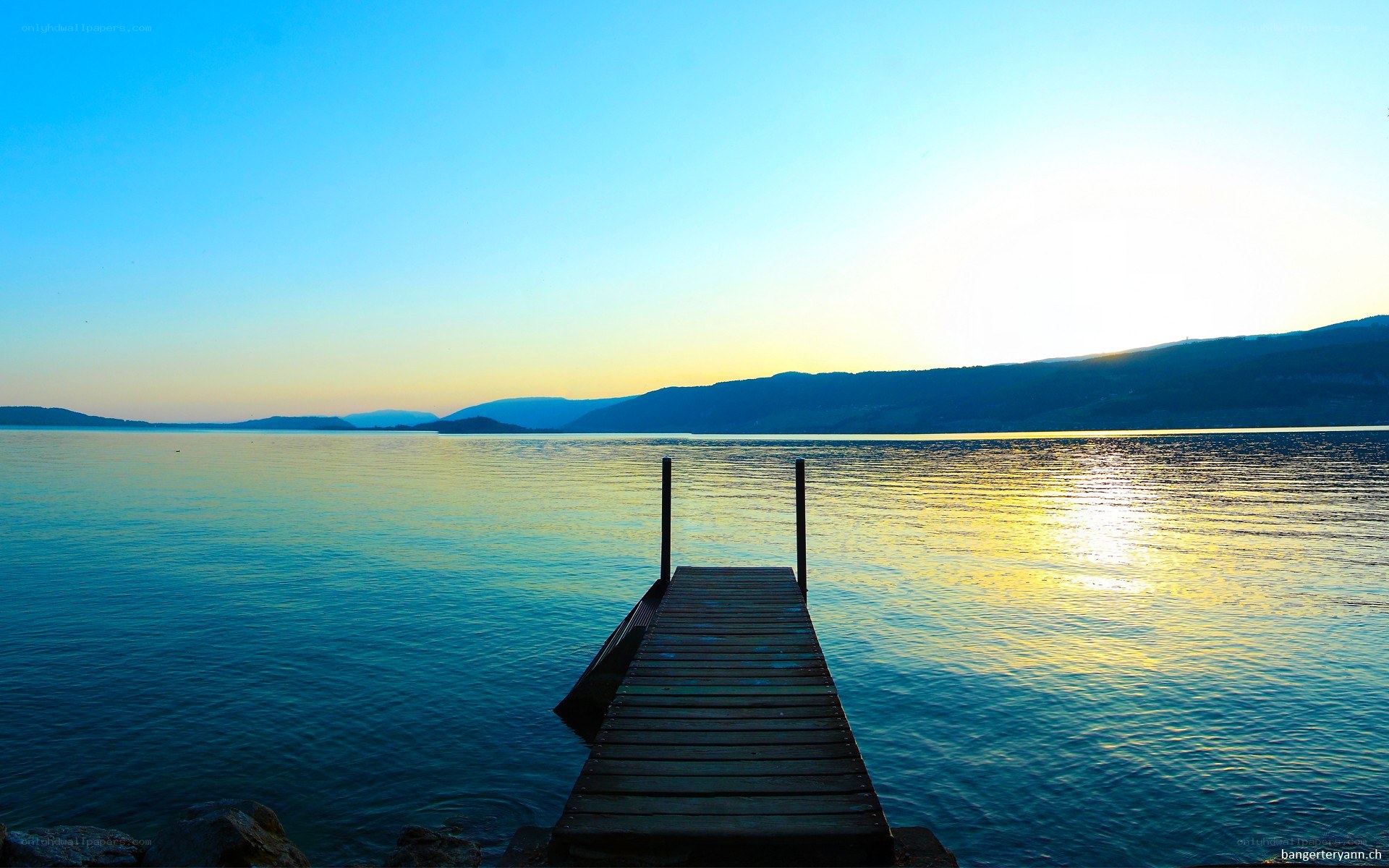 Wooden dock at sunset