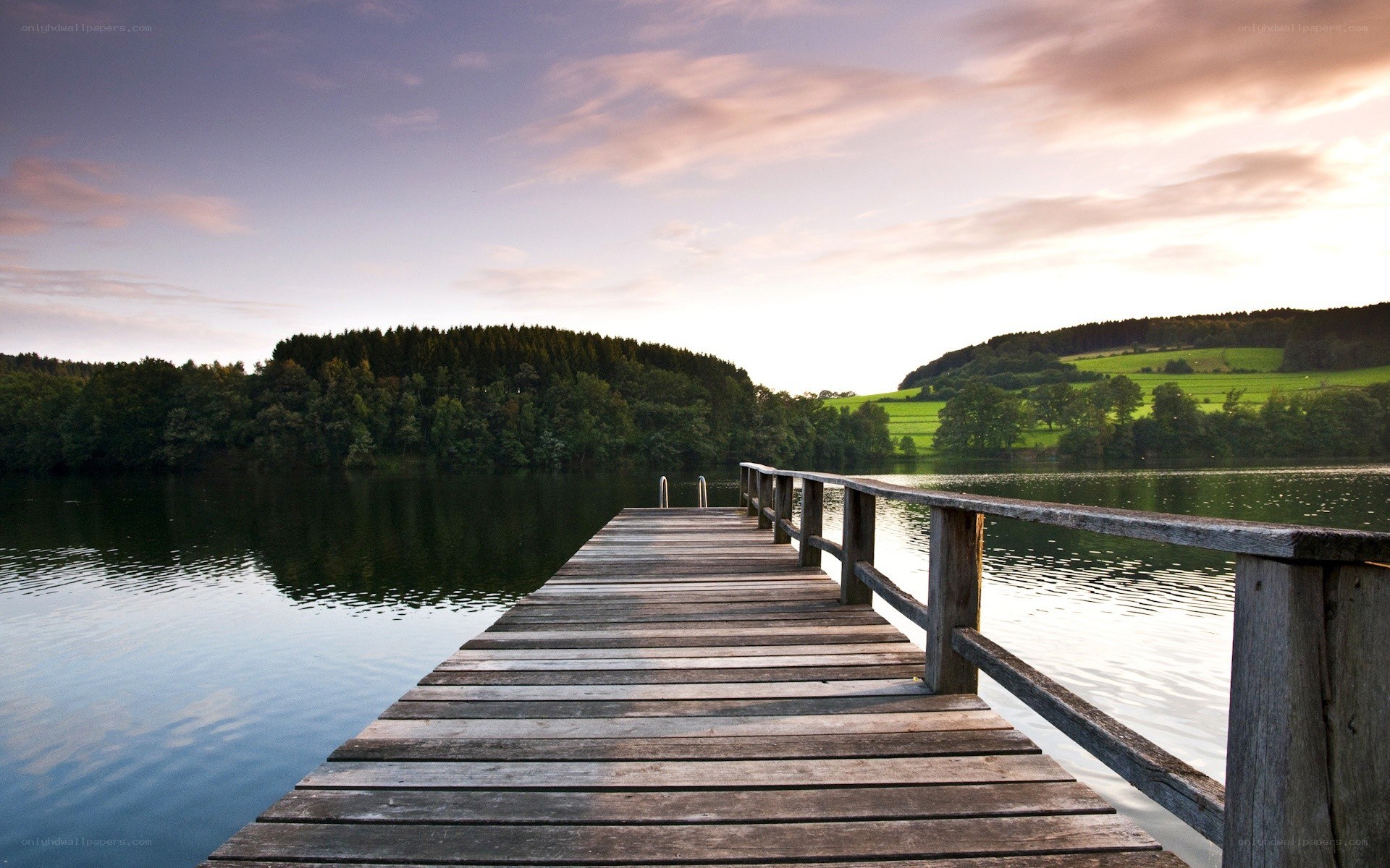 Wooden dock at sunset
