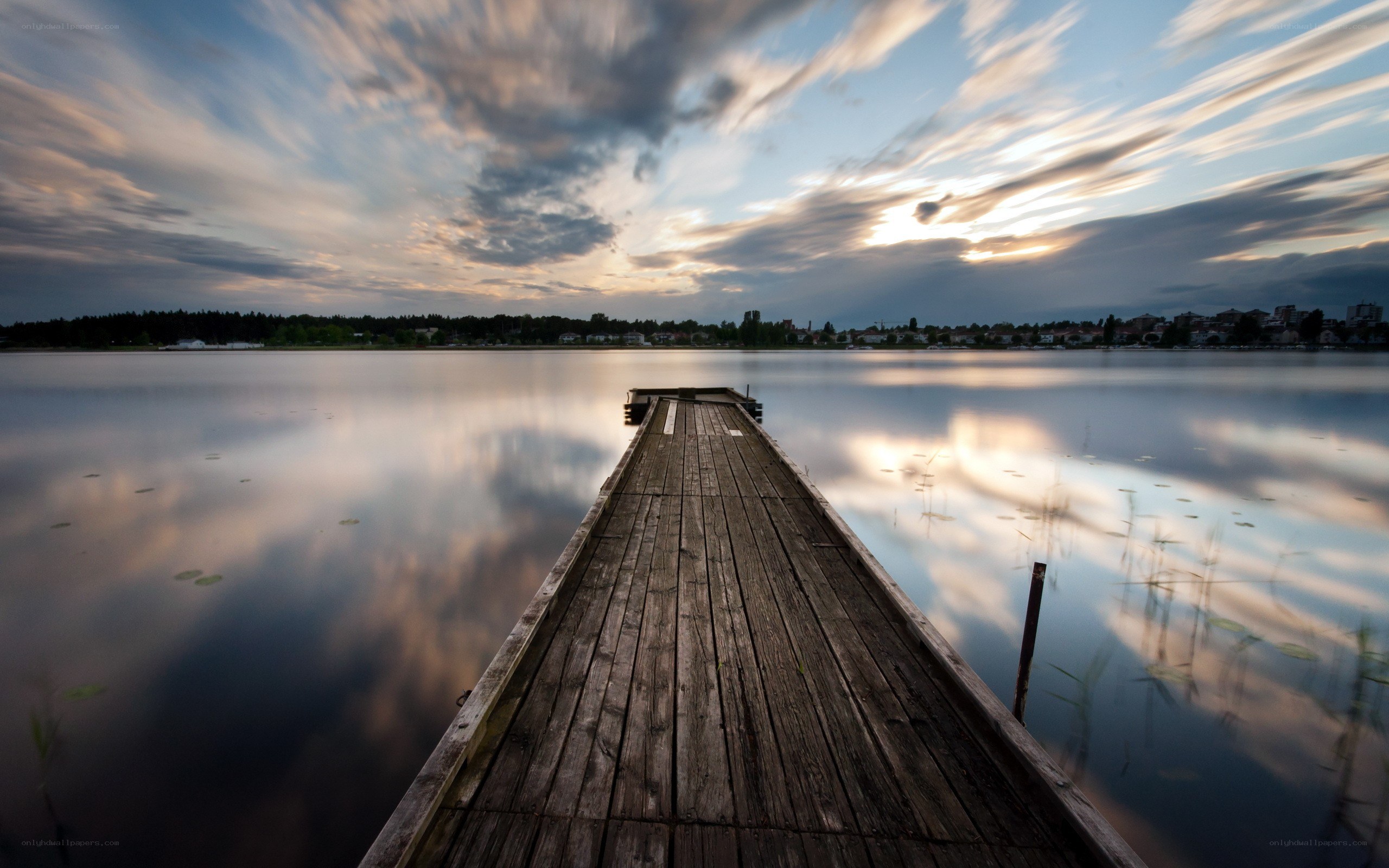 Wooden dock at sunset