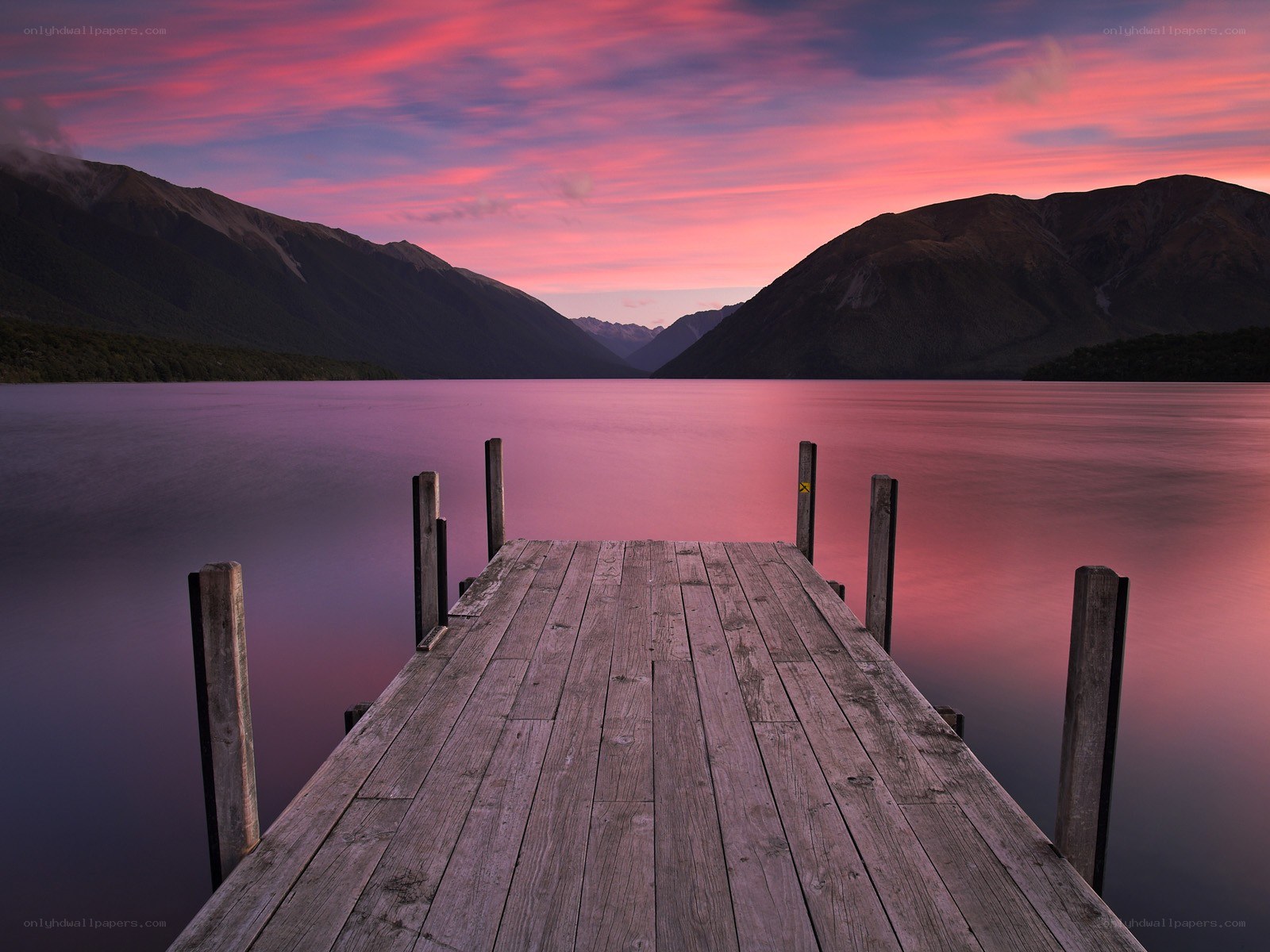 Wooden dock at sunset