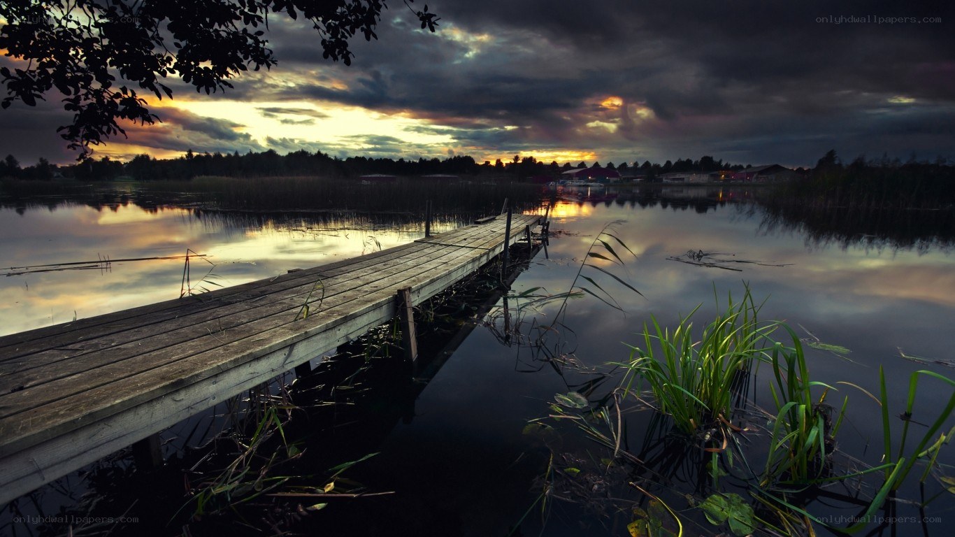 Wooden dock at sunset