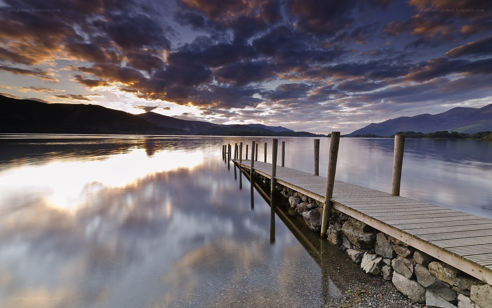 Wooden dock at sunset