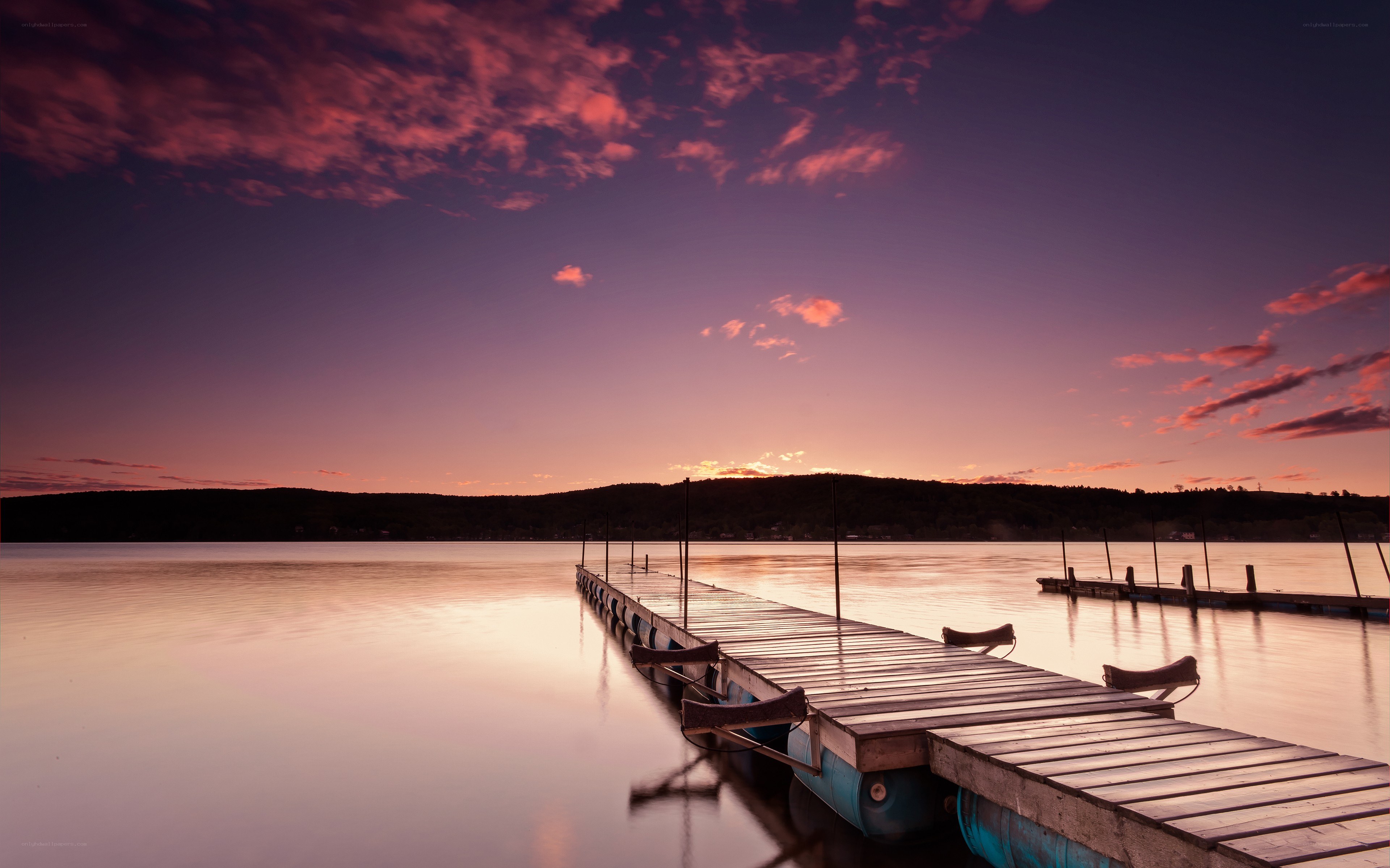 Wooden dock at sunset
