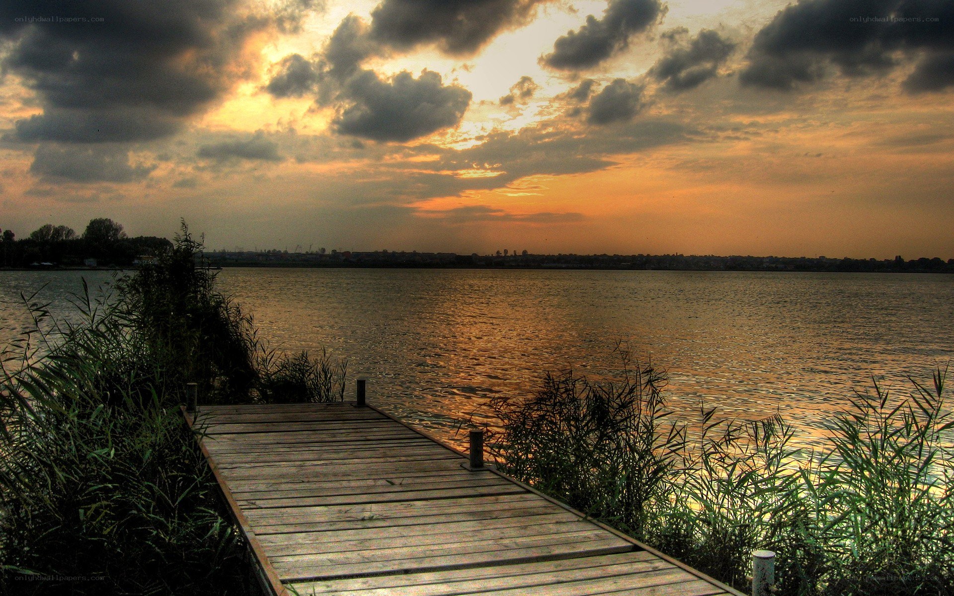 Wooden dock at sunset