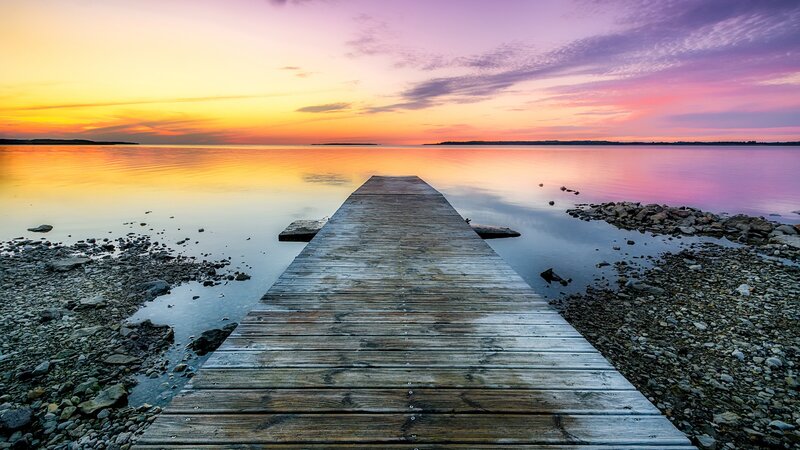 Wooden dock at sunset